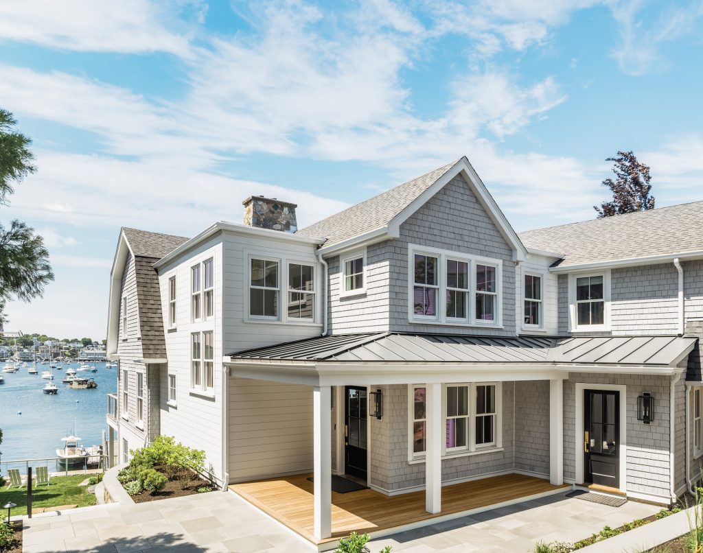 Crew installing weather-resistant siding on a home in Boynton Beach Florida