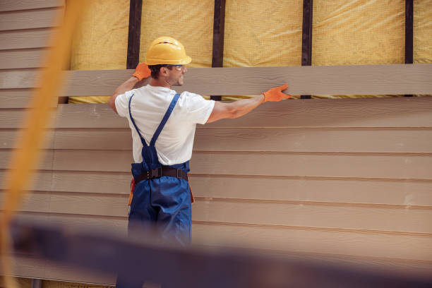 K-Boys Construction crew installing weather-resistant siding on a home in Palm Beach Gardens, Florida.