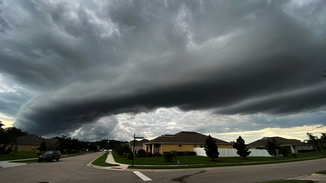 K-Boys Construction technician sealing exterior joints as part of weatherproofing in Palm Beach County.